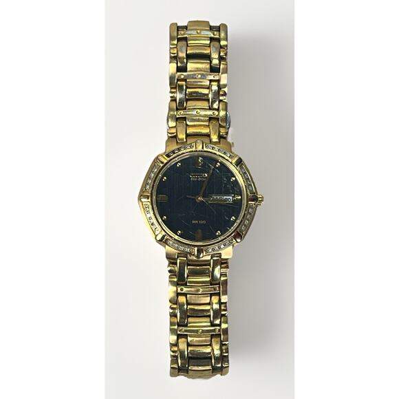Citizen Eco-Drive Diamond Bezel Gold Tone Day Date Spanish WR100 Watch Works main image 13